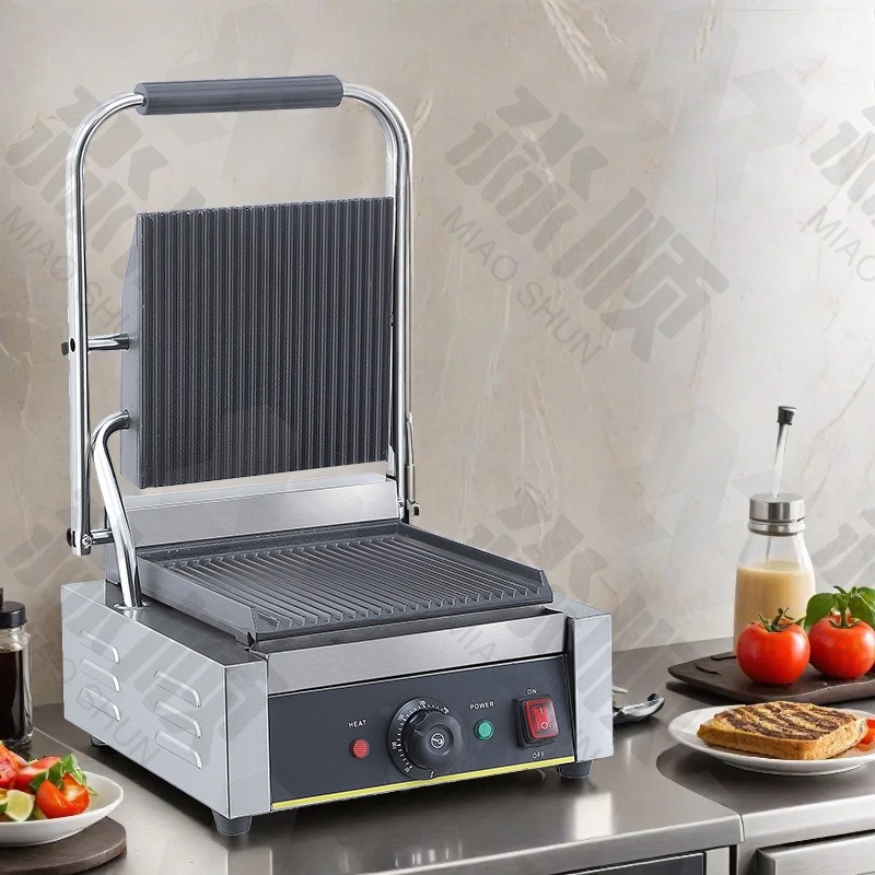 เตาปิ้งย่างไฟฟ้าแบบแผ่นเรียบแล - Sandwich Press Grill บทวิจารณ์และราคา